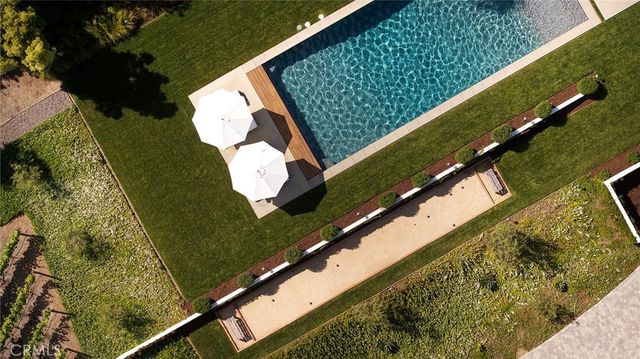 a view of swimming pool from a balcony