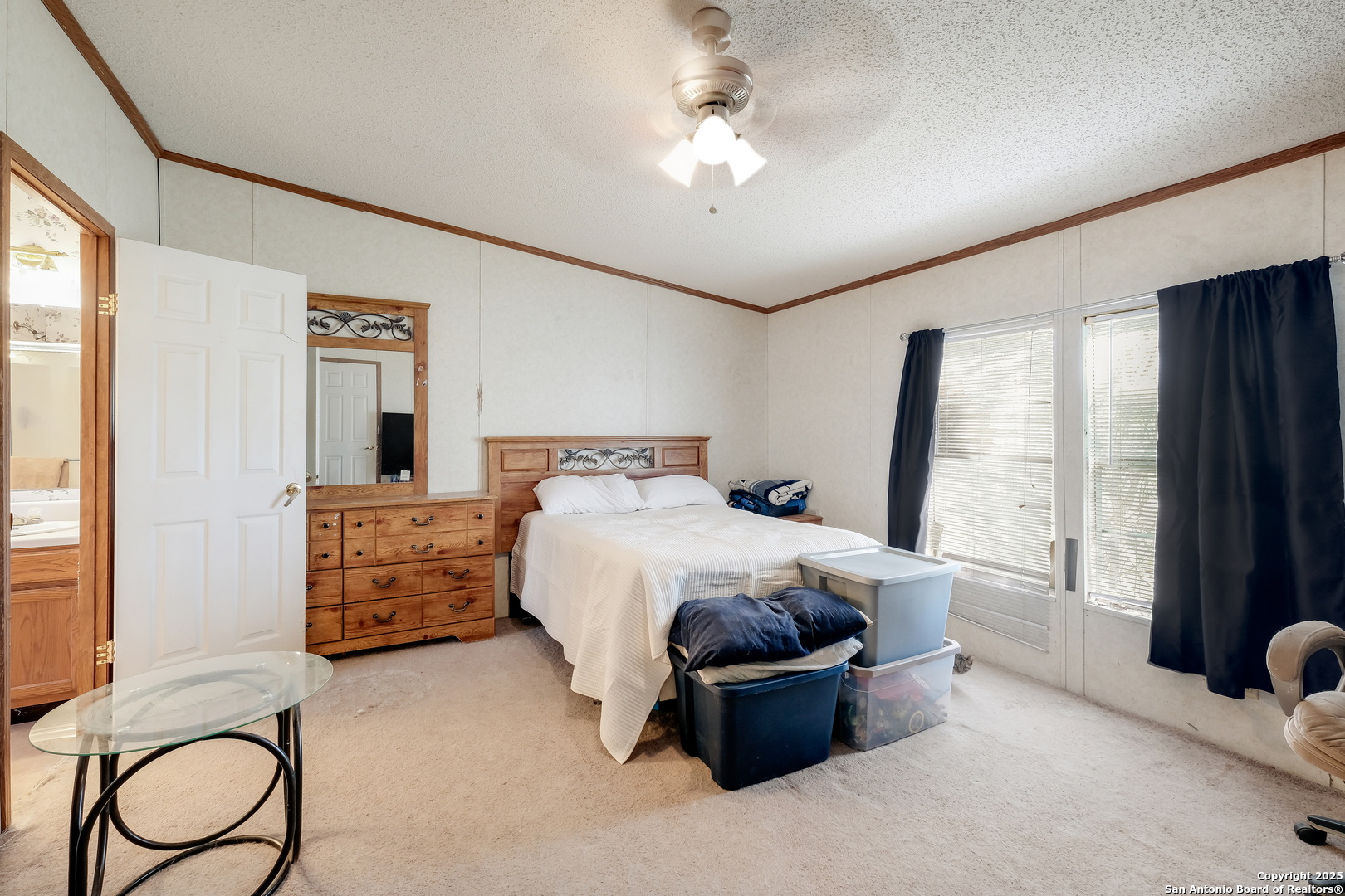 104 Kickapoo Trail Seguin, TX 78155 - Photo 15 of 21 a bed room with a bed and a chair