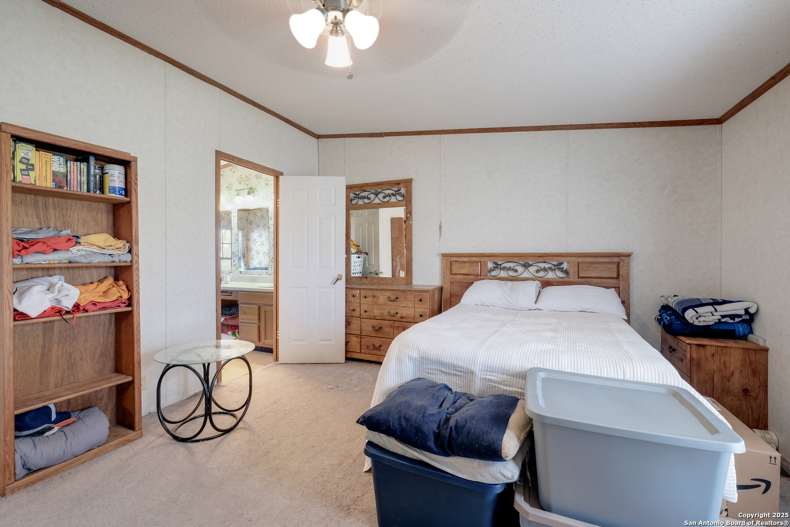 104 Kickapoo Trail Seguin, TX 78155 - Photo 17 of 21 a bedroom with furniture and a window