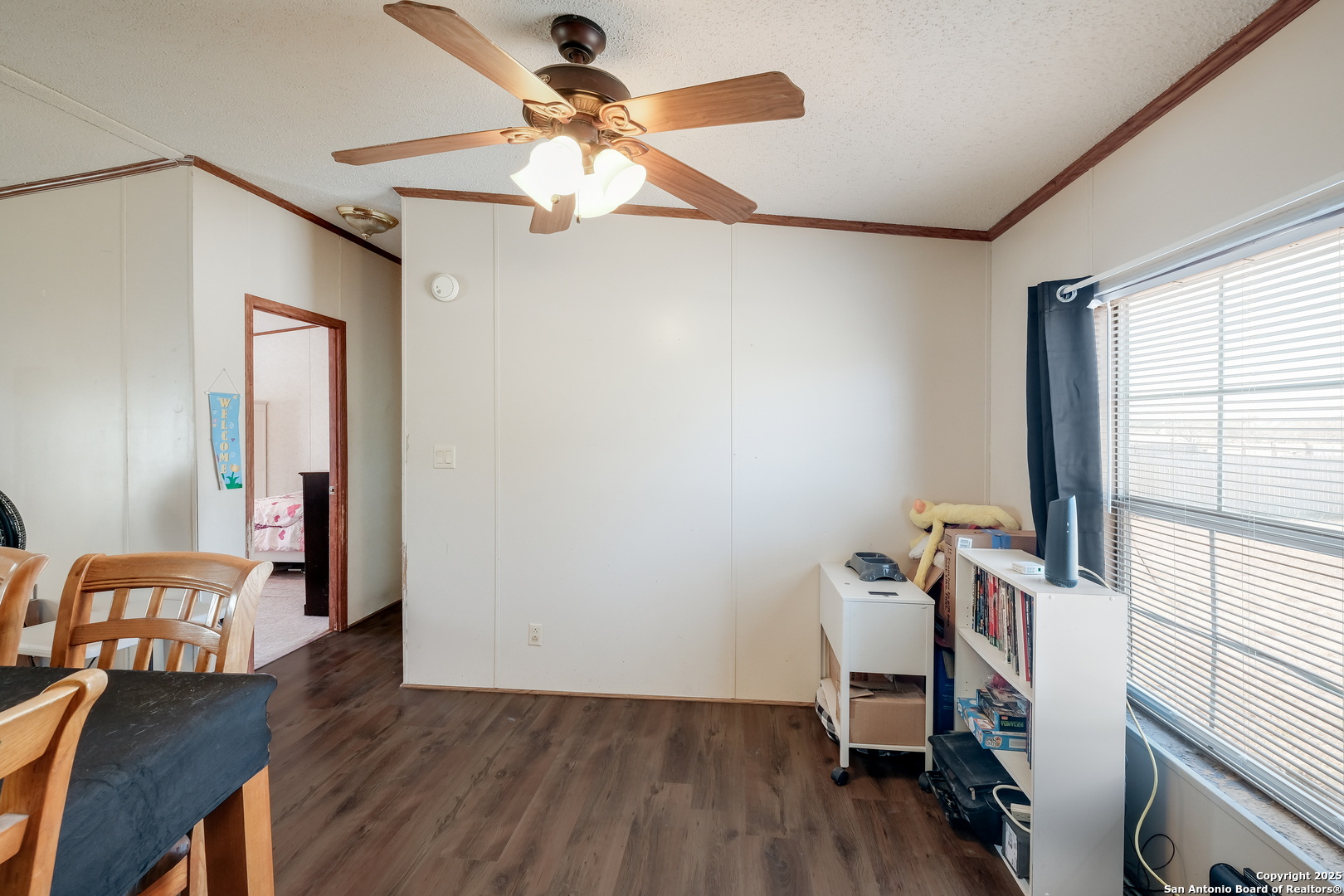 104 Kickapoo Trail Seguin, TX 78155 - Photo 9 of 21 a view of a workspace with furniture and a window