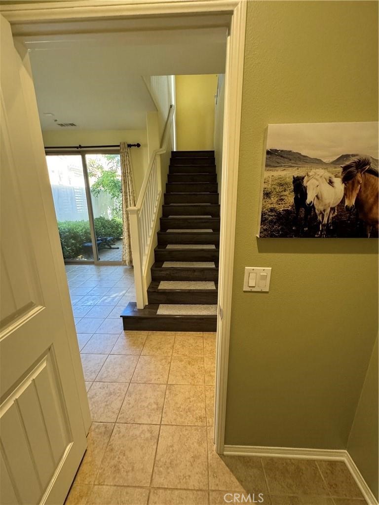 20323 Livorno Way Porter Ranch, CA 91326 - Photo 5 of 14 a view of entryway with furniture and wooden floor