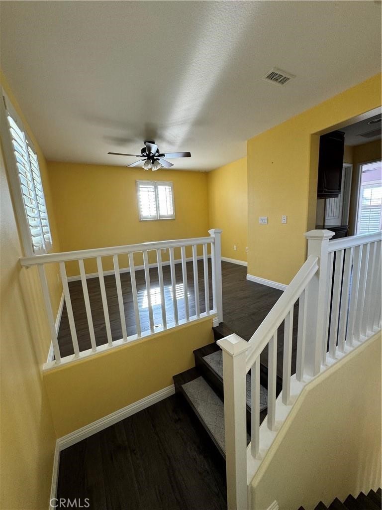 20323 Livorno Way Porter Ranch, CA 91326 - Photo 6 of 14 a view of a porch with wooden floor