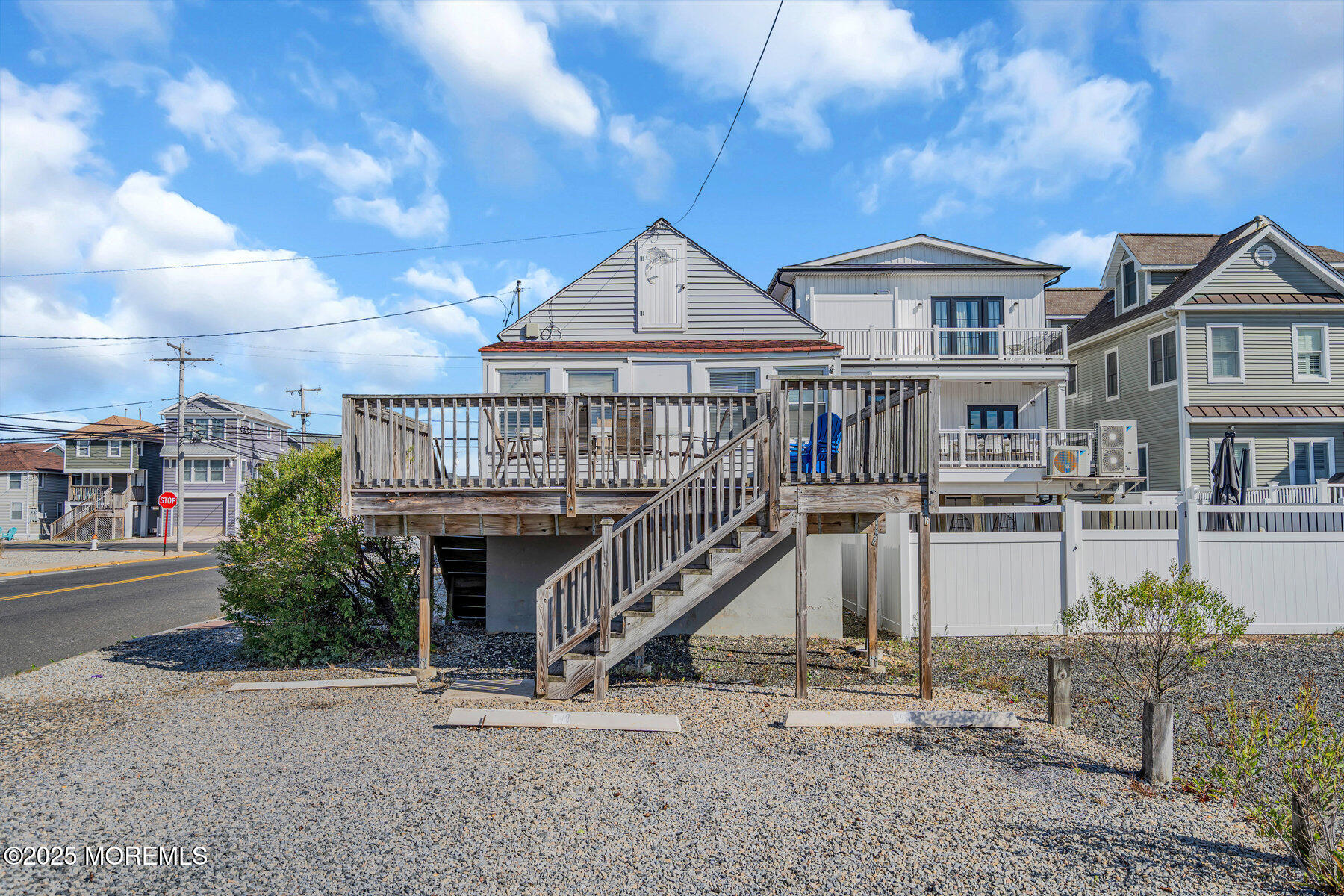549 Brielle Road, Unit 1/2 Manasquan, NJ 08736 - Photo 2 of 10 a front view of a house with a yard