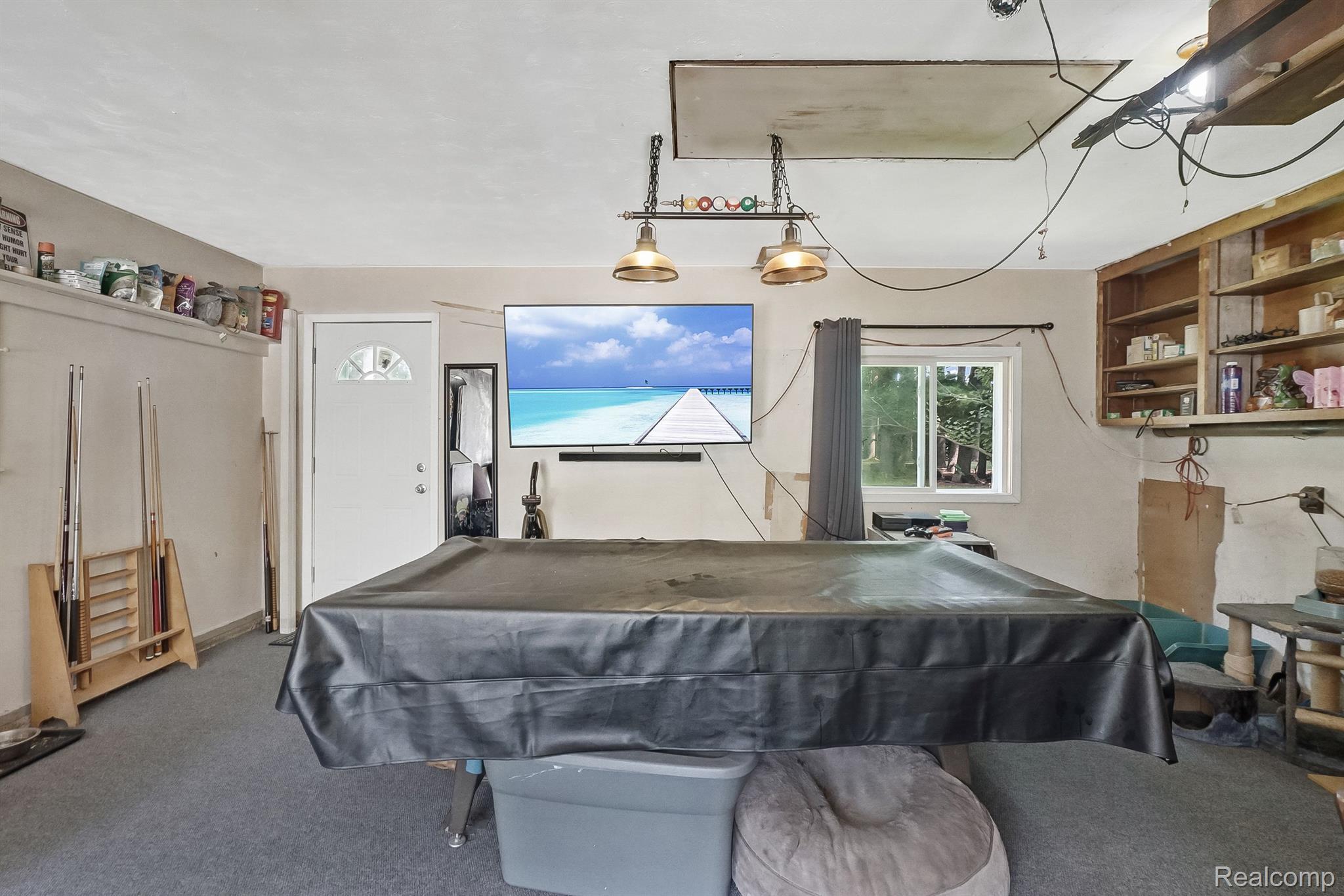 3707 Judd Road Milan, MI 48160 - Photo 30 of 39 Man cave complete with carpet tiles, heat and A/C