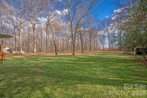 $995,000 | 316 Wade Hampton Drive, Matthews, NC 28104