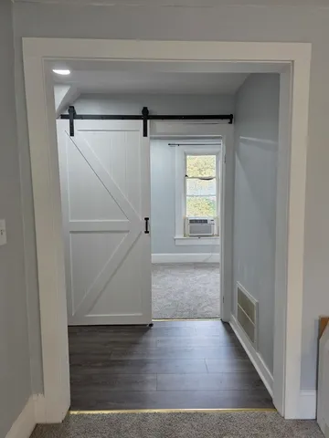 a view of an empty room and window