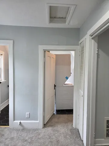 a bathroom with a sink vanity and mirror