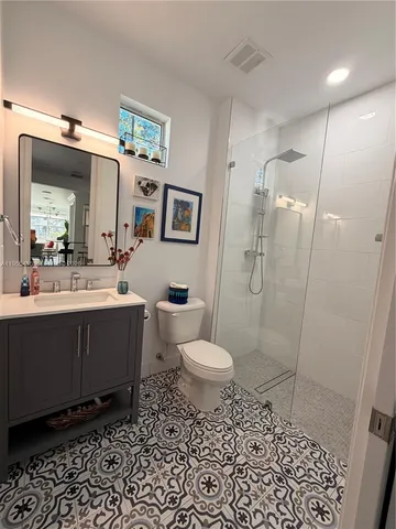 a view of a balcony with chair and table