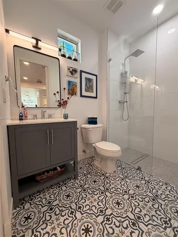 a spacious bathroom with a tub and a sink