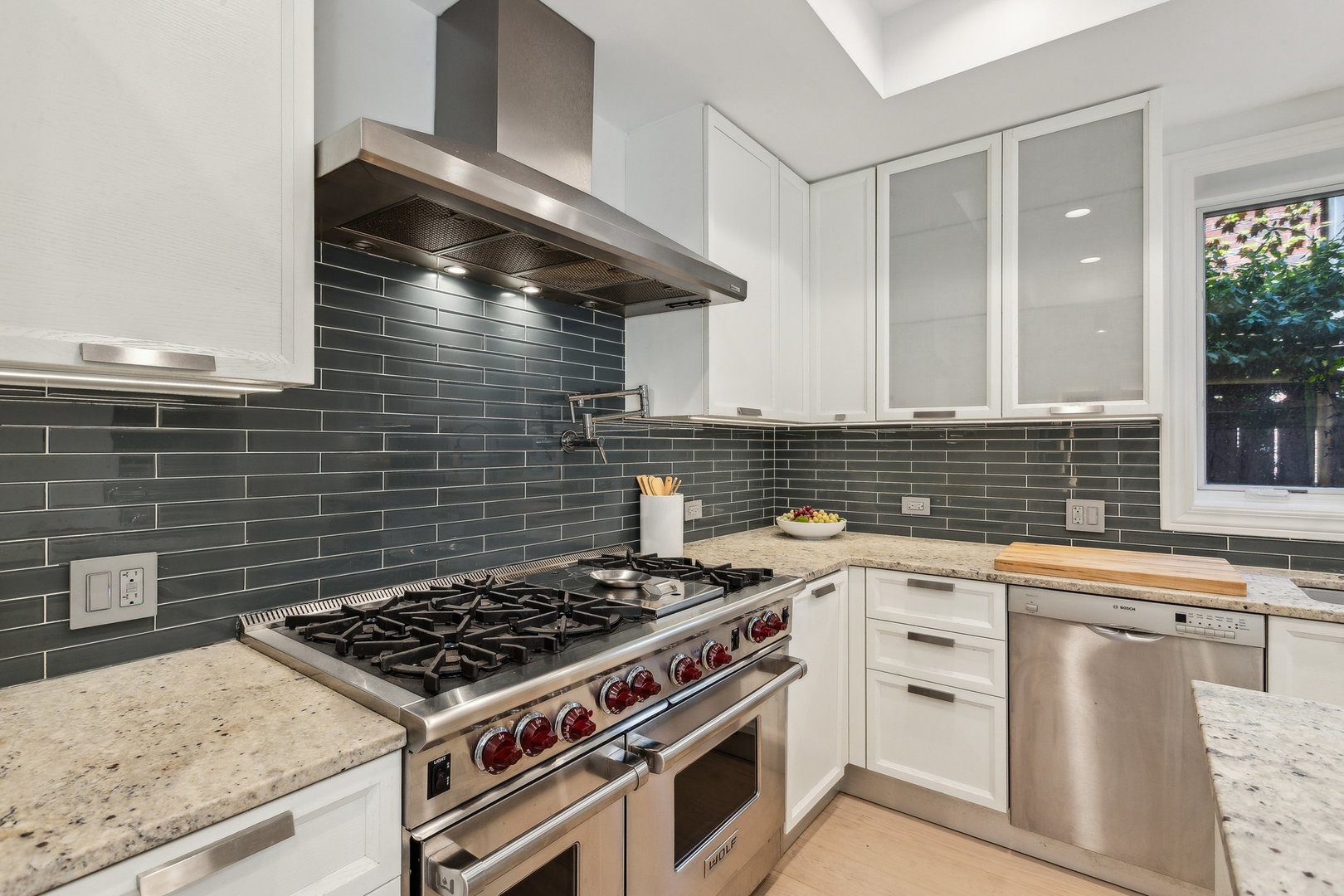 579 West Hawthorne Place Chicago, IL 60657 - Photo 21 of 65 a stove top oven sitting inside of a kitchen