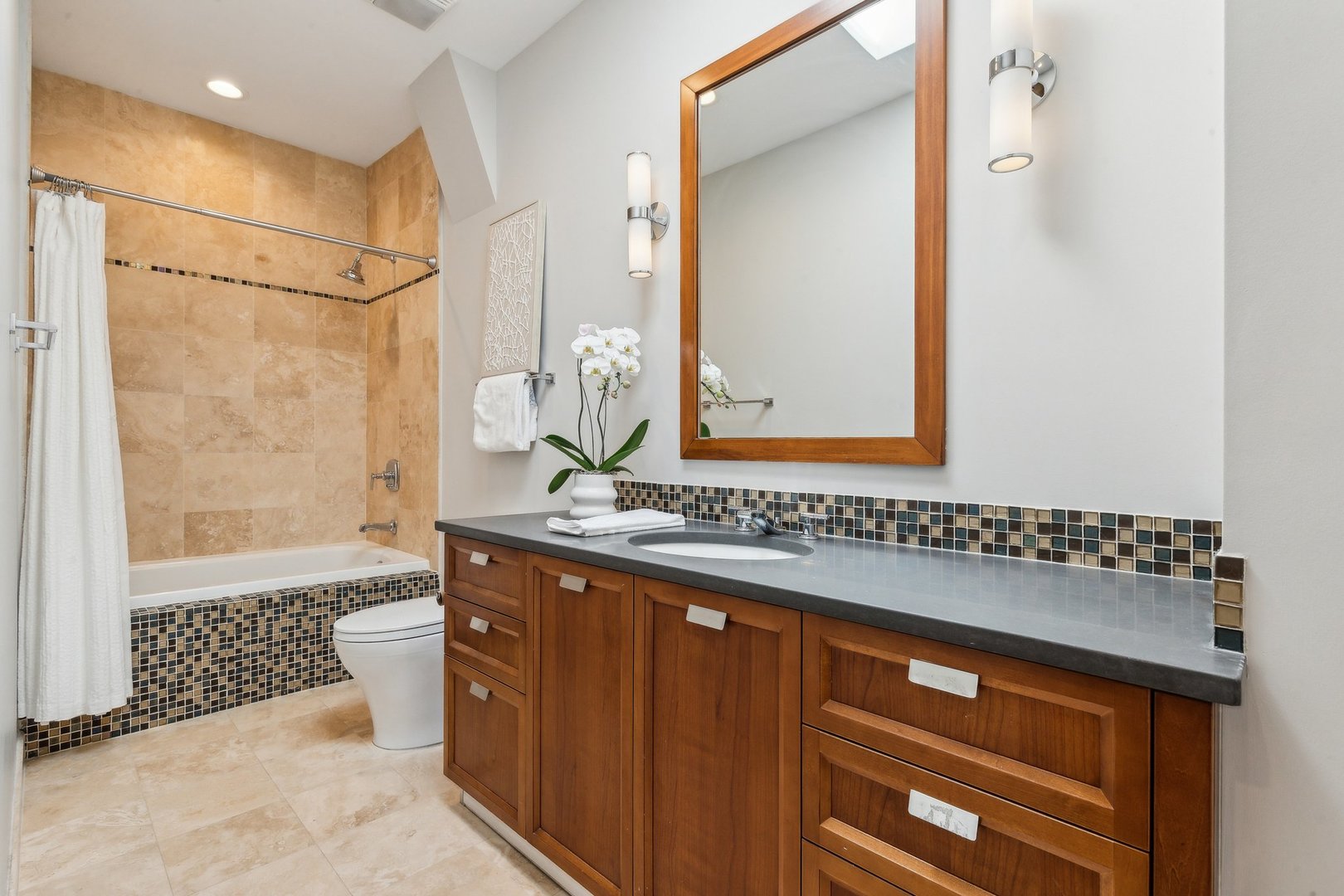 579 West Hawthorne Place Chicago, IL 60657 - Photo 42 of 65 a bathroom with a double vanity sink mirror and shower
