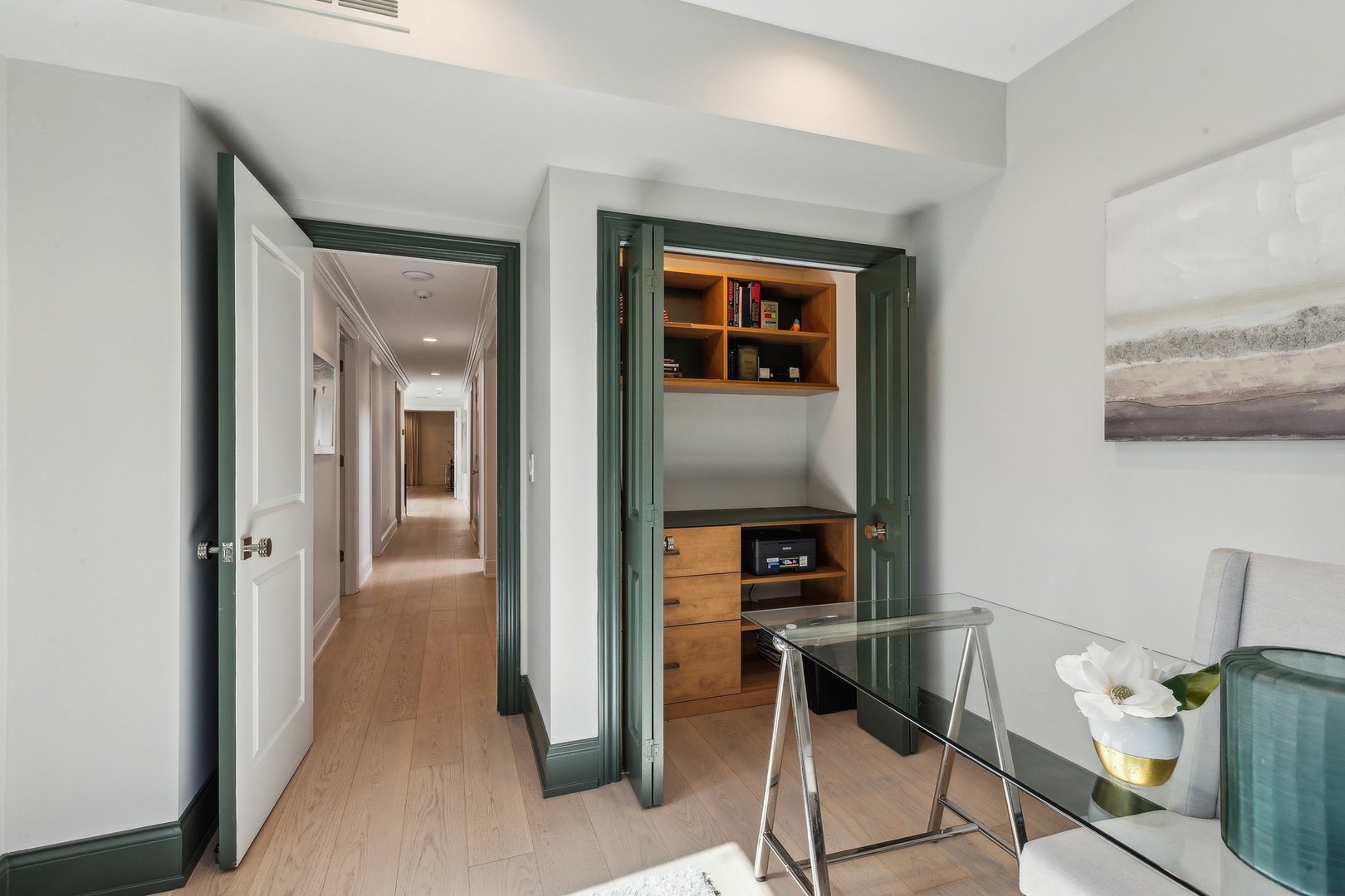 579 West Hawthorne Place Chicago, IL 60657 - Photo 48 of 65 a view of a hallway to a livingroom and a livingroom with furniture