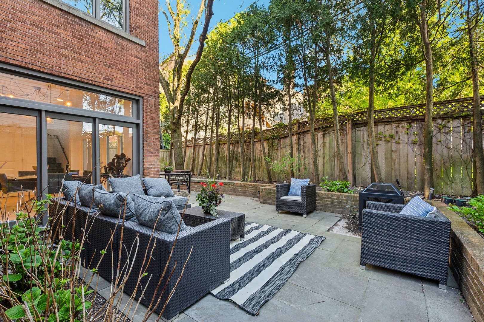 579 West Hawthorne Place Chicago, IL 60657 - Photo 54 of 65 a patio with patio a couch and wooden floor