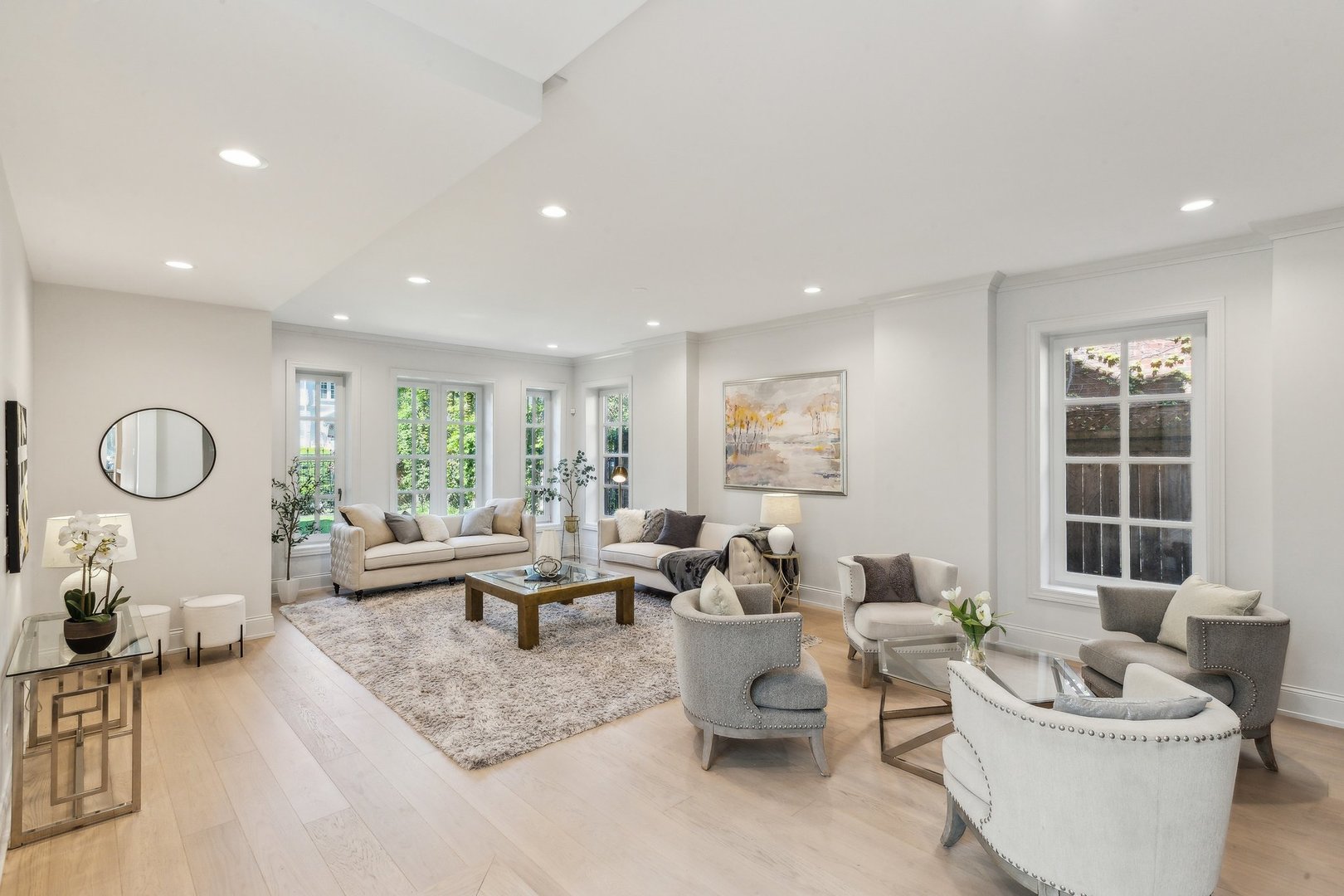 579 West Hawthorne Place Chicago, IL 60657 - Photo 6 of 65 a living room with furniture potted plant and a large window