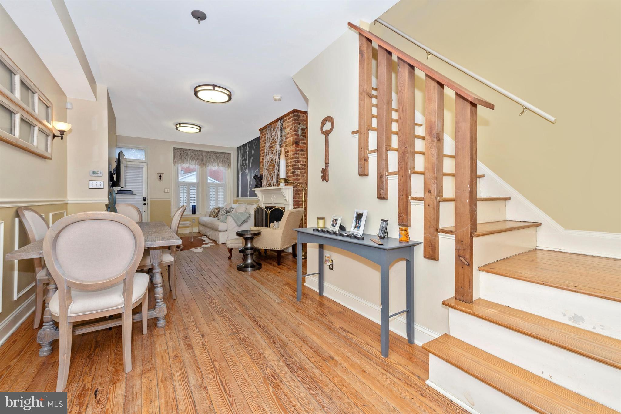 207 Center Street Frederick, MD 21701 - Photo 11 of 36 Stairway to upper level. Tons of character.