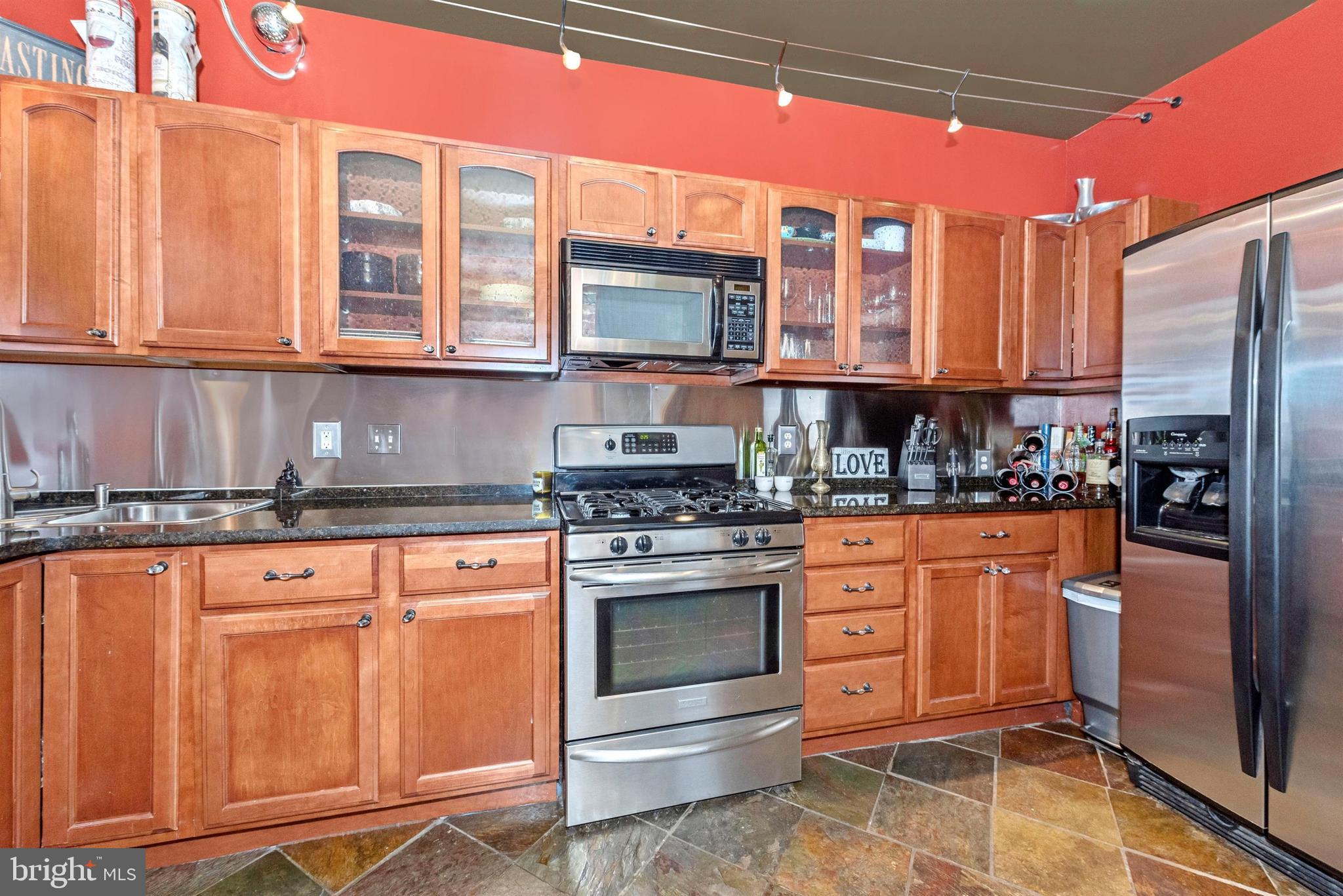 207 Center Street Frederick, MD 21701 - Photo 13 of 36 Spacious kitchen with accent lighting.