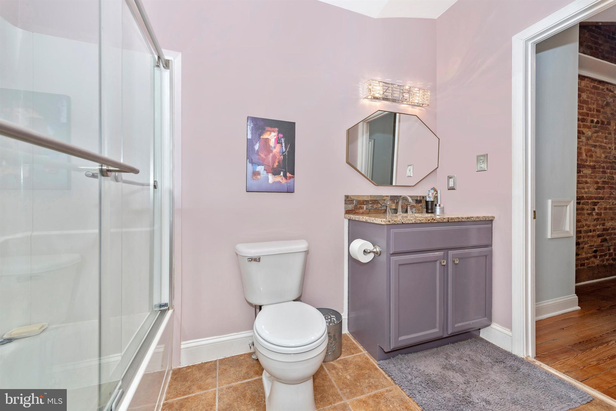 207 Center Street Frederick, MD 21701 - Photo 20 of 36 First of two master suite bathrooms.