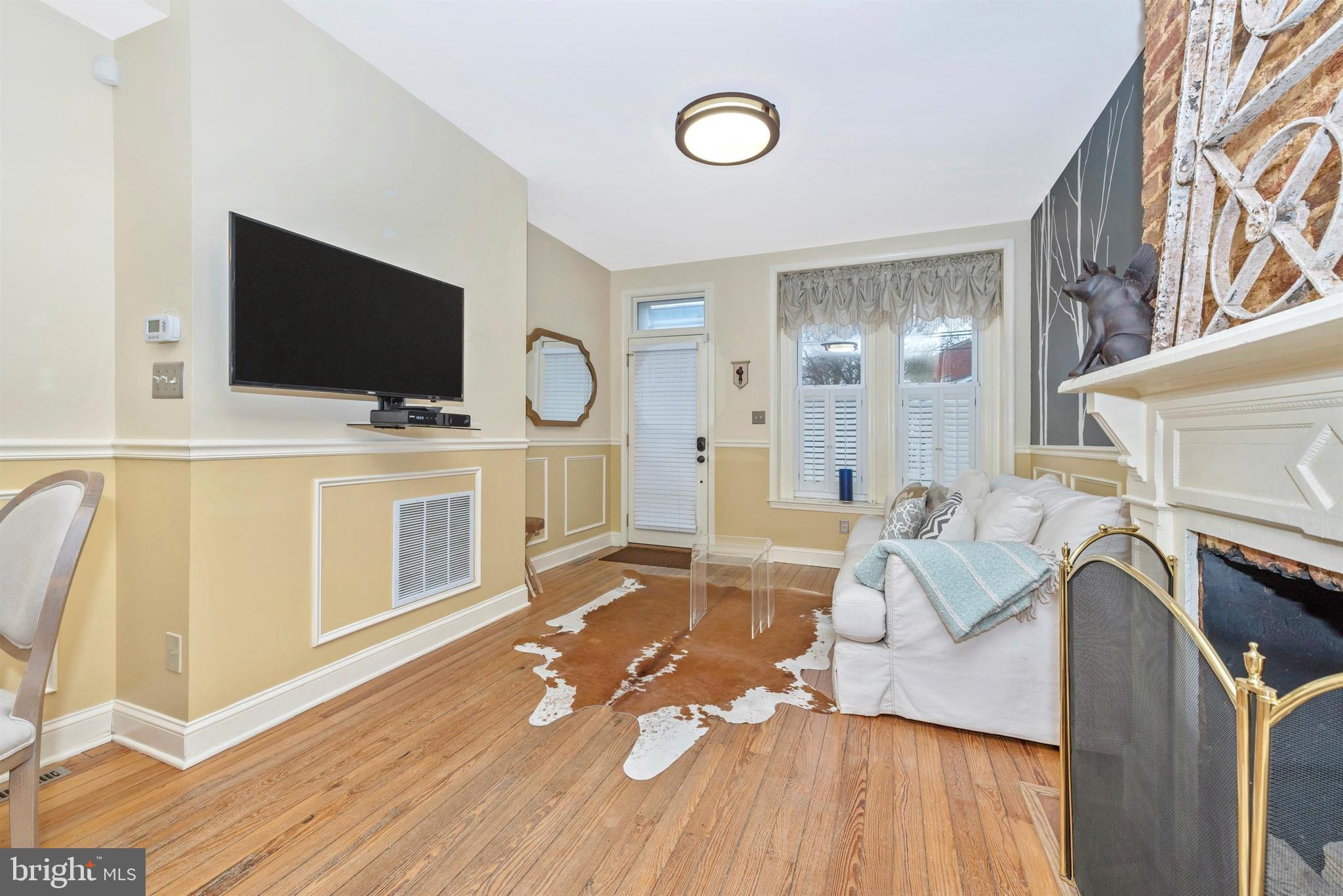 207 Center Street Frederick, MD 21701 - Photo 6 of 36 Feel the downtown charm right away.