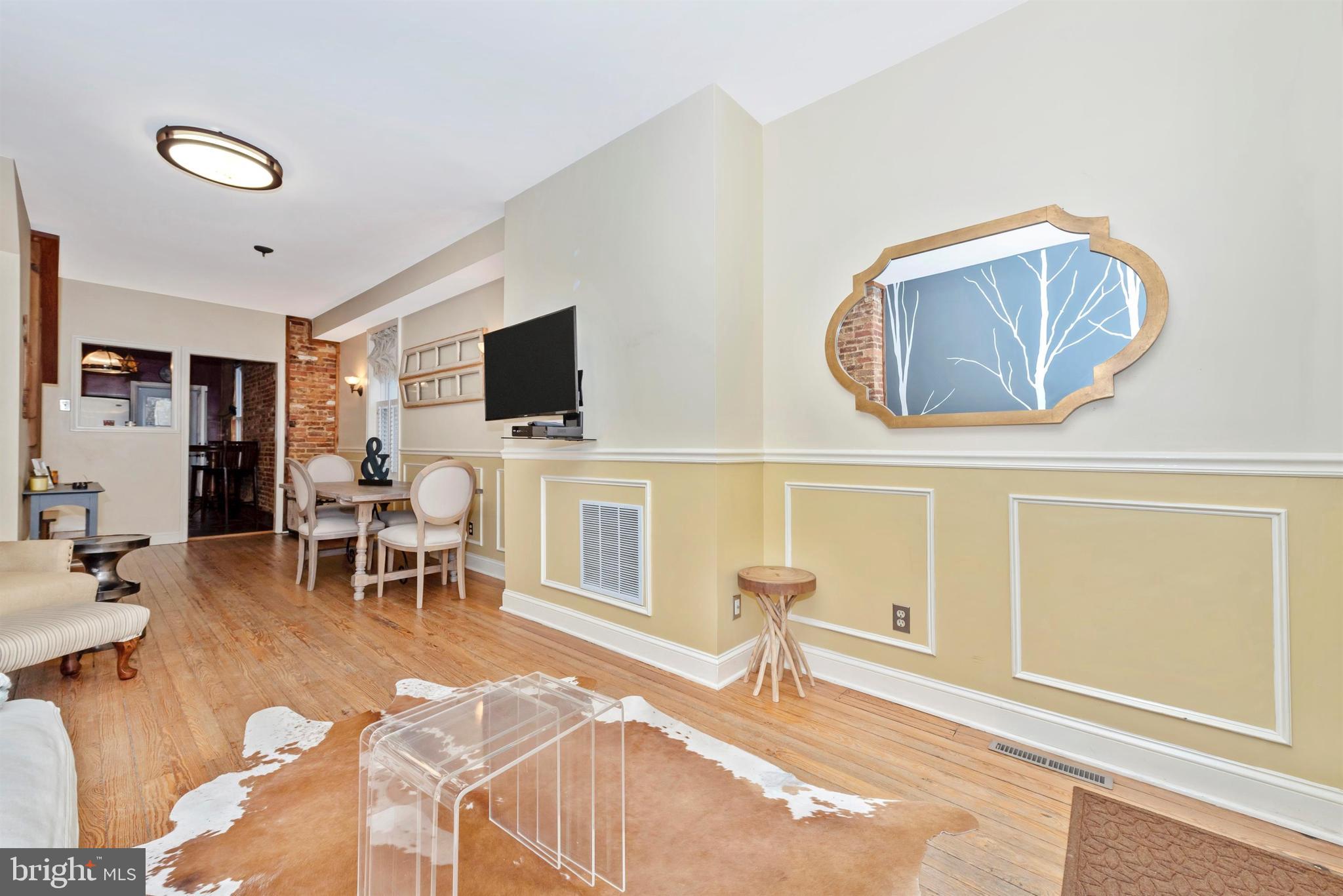 207 Center Street Frederick, MD 21701 - Photo 7 of 36 Great layout and design leading to dining room.
