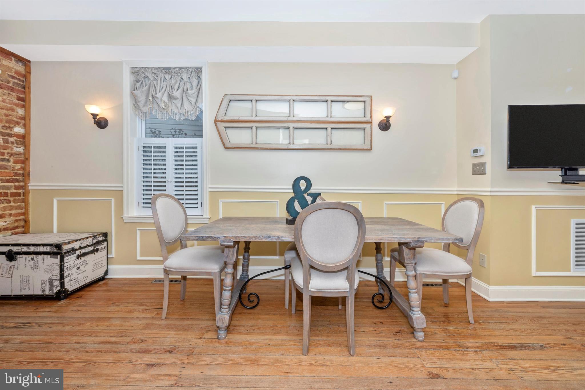 207 Center Street Frederick, MD 21701 - Photo 9 of 36 Wainscoting and accent lighting.