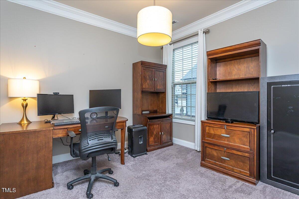 7656 Channery Way Raleigh, NC 27616 - Photo 21 of 44 First floor bedroom