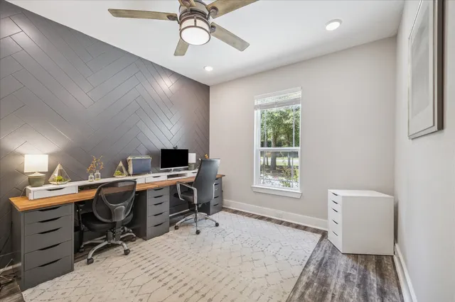 a workspace with furniture and window