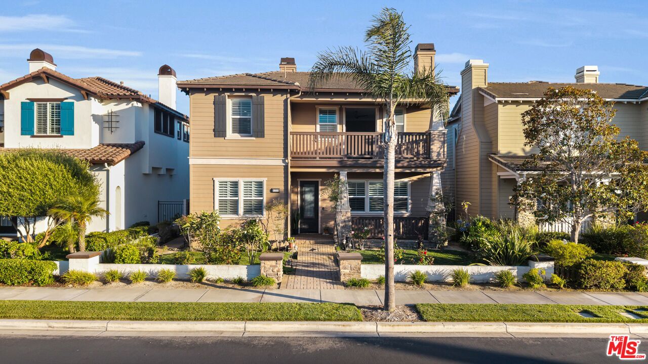 a front view of a house with street