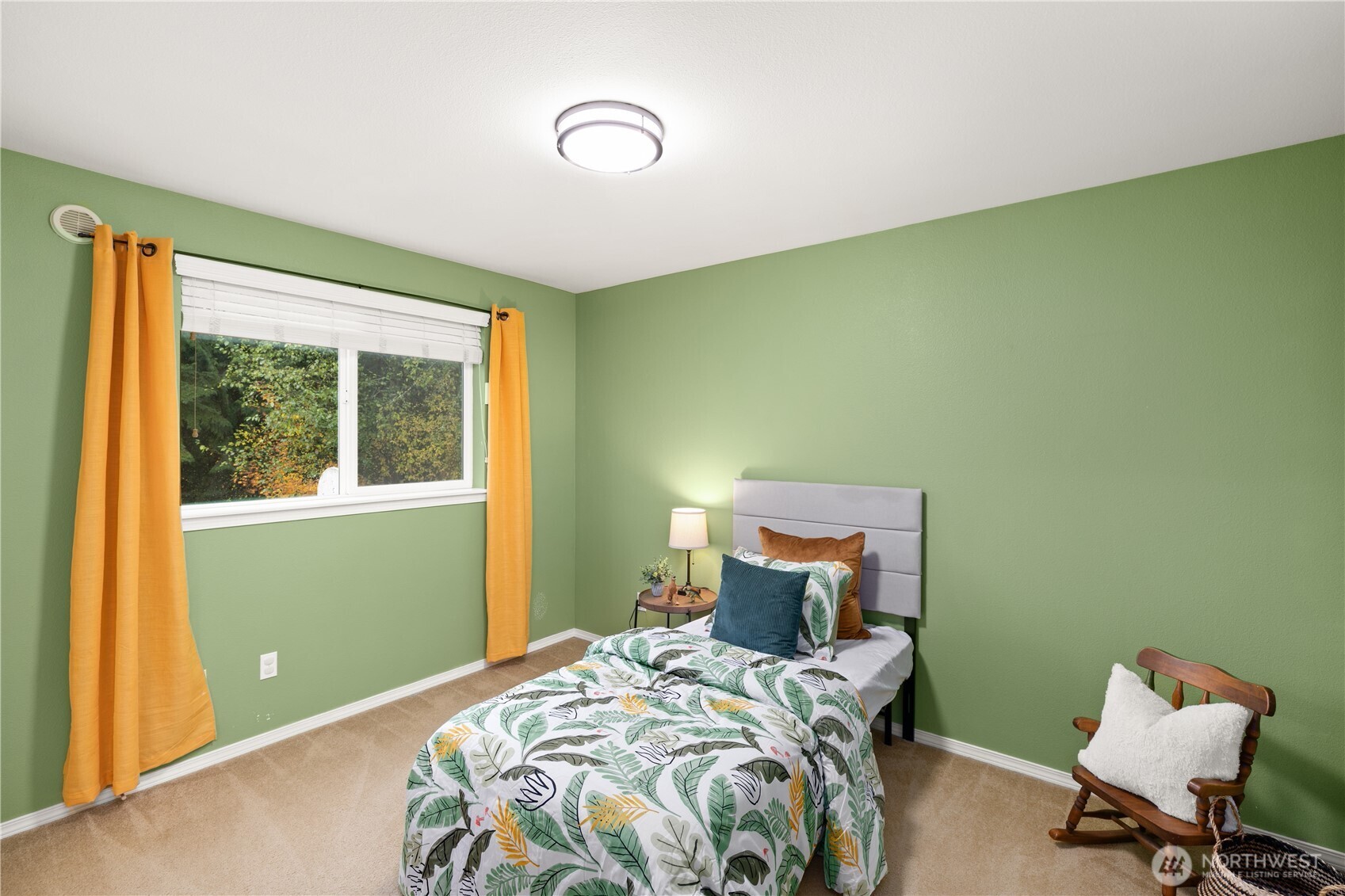 16015 123rd Ave Court East Puyallup, WA 98374 - Photo 17 of 26 a bedroom with a bed and windows