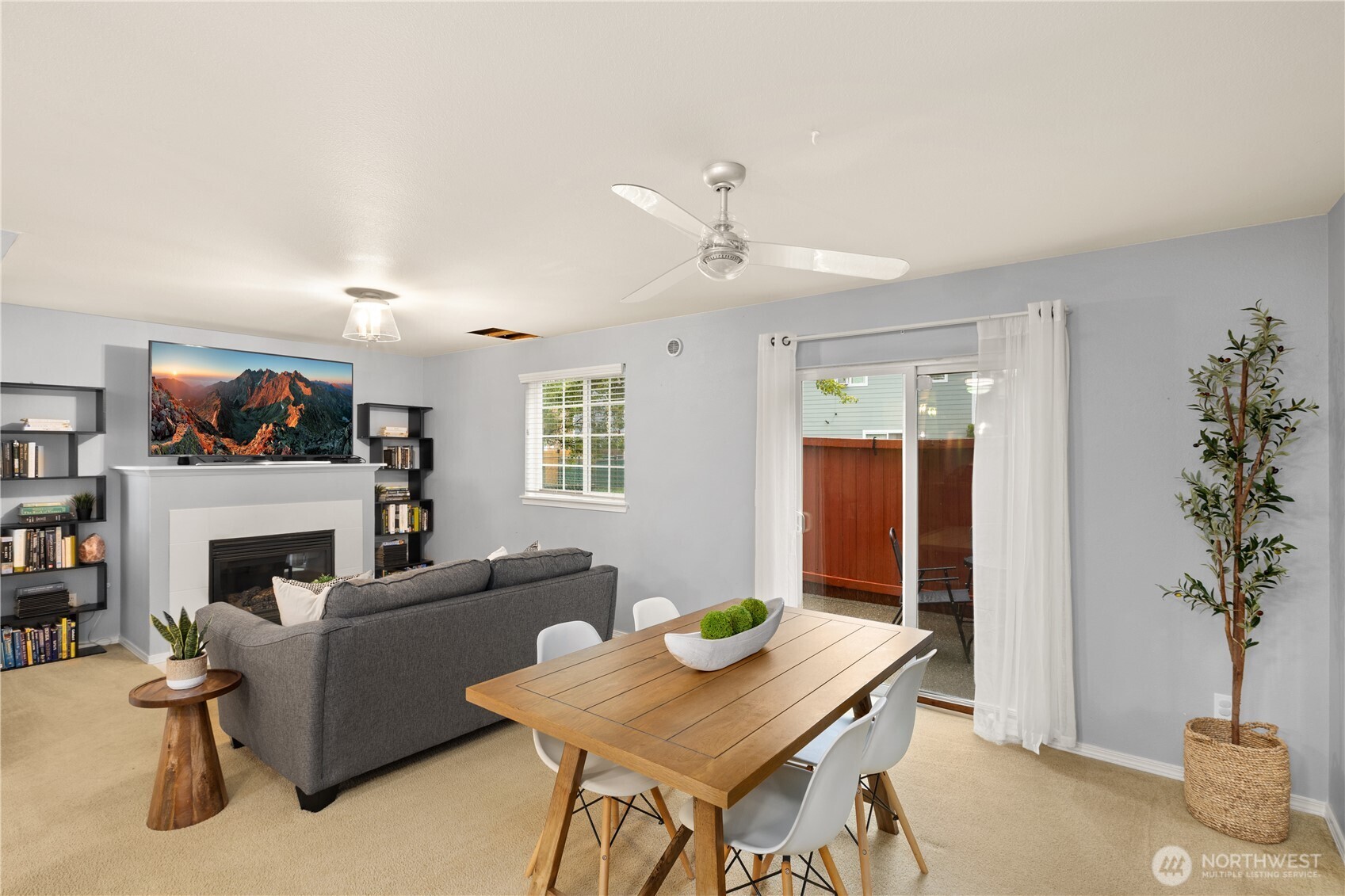 16015 123rd Ave Court East Puyallup, WA 98374 - Photo 4 of 26 a living room with furniture and a fireplace
