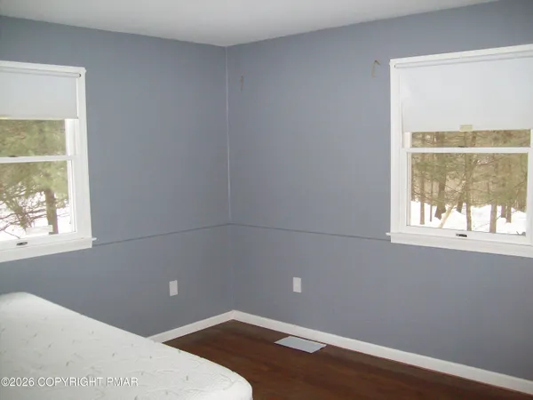 a view of small space with racks on the wall