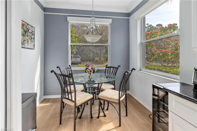 a bedroom with a bed and a mirror