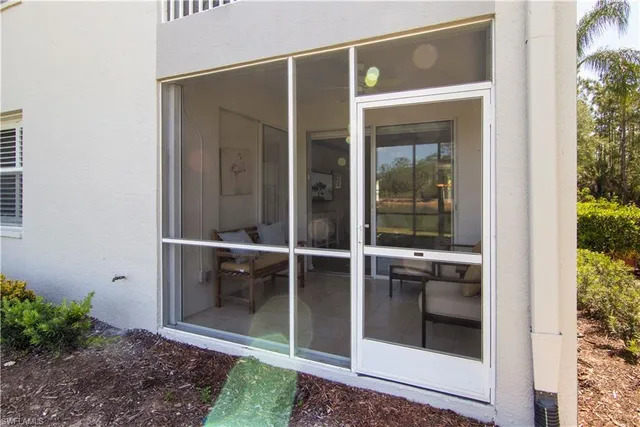 a view of a golf course with a lake