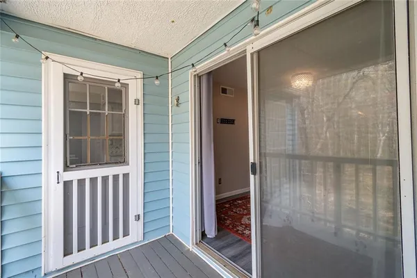 a view of a porch with a door