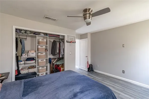 a view of a storage & utility room with closet