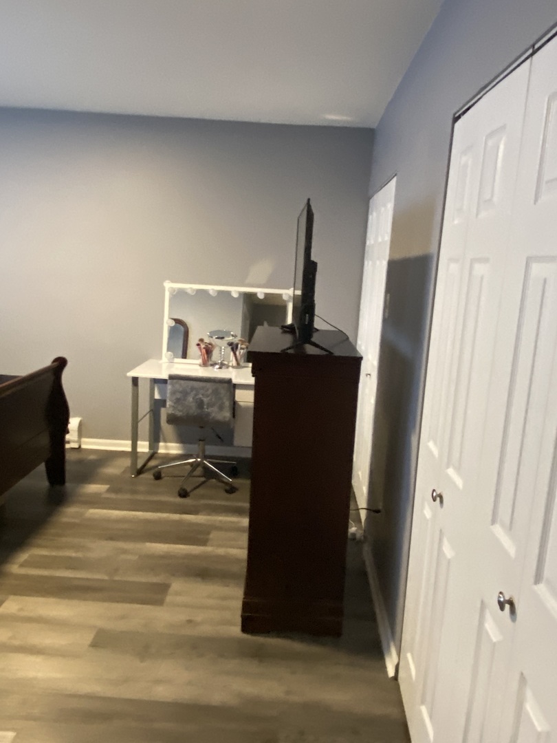 7000 Mather Avenue, Unit 101 Chicago Ridge, IL 60415 - Photo 16 of 21 a living room with furniture