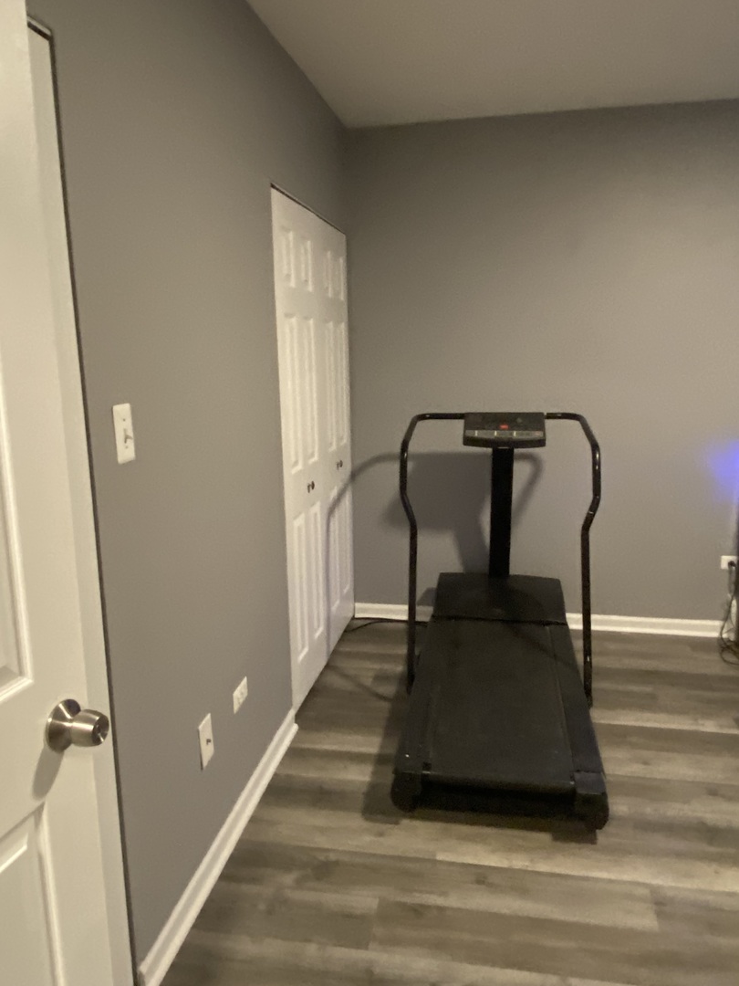 7000 Mather Avenue, Unit 101 Chicago Ridge, IL 60415 - Photo 17 of 21 a view of entryway and hall with wooden floor