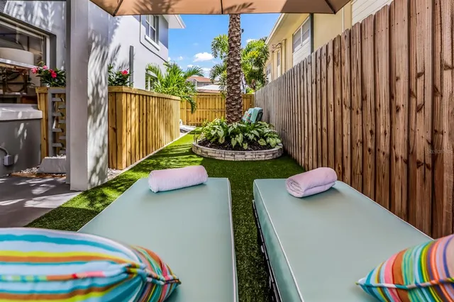 a work room with furniture and a rug
