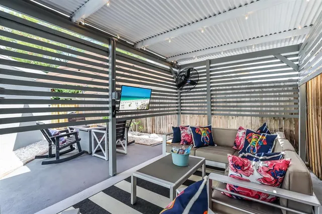 a view of a swimming pool with a patio