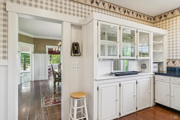 a kitchen with stainless steel appliances granite countertop a sink and cabinets