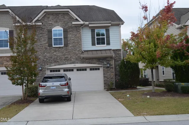 a car parked in front of a house