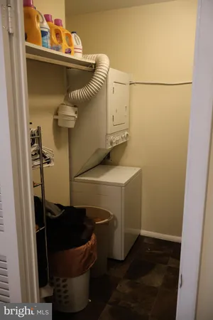 a view of a bathroom with a sink and mirror
