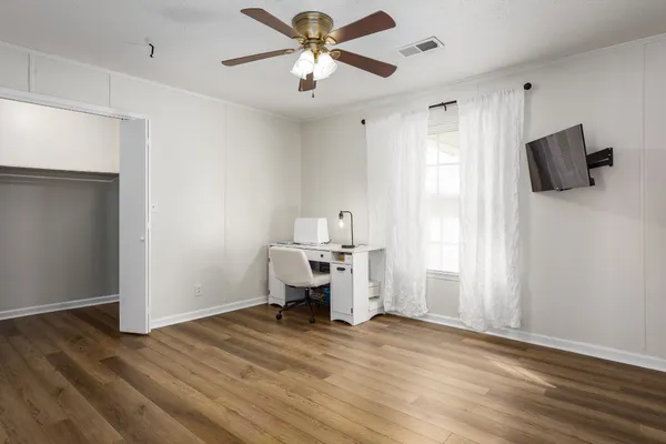 a view of a livingroom with a flat screen tv