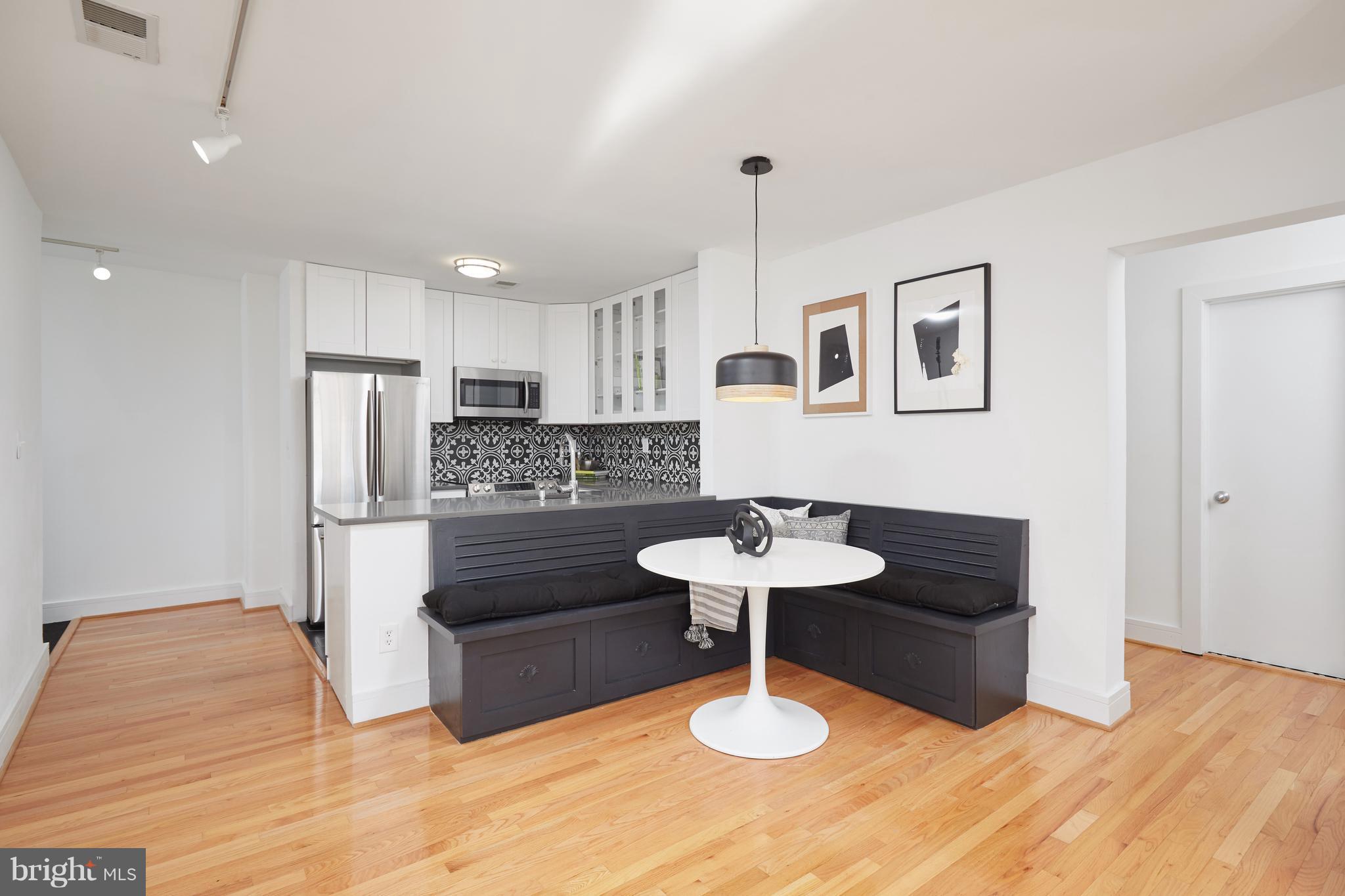 2901 16th Street Northwest, Unit 504 Washington, DC 20009 - Photo 11 of 30 Eat-In Kitchen with Built-In Seating & Storage