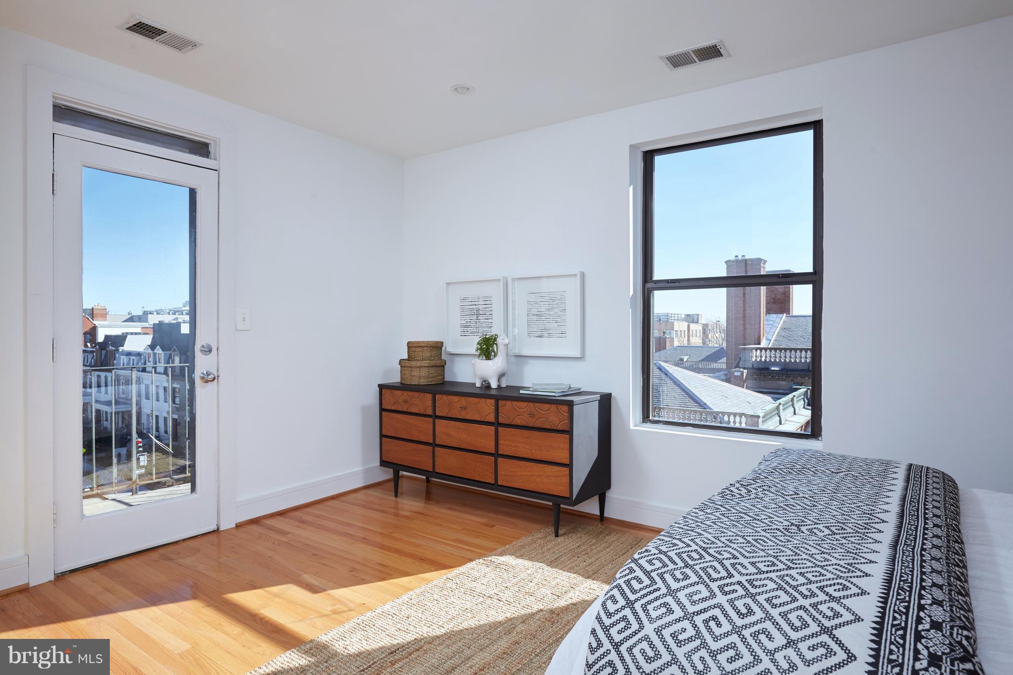 2901 16th Street Northwest, Unit 504 Washington, DC 20009 - Photo 18 of 30 Master Bedroom with East-Facing Private Balcony