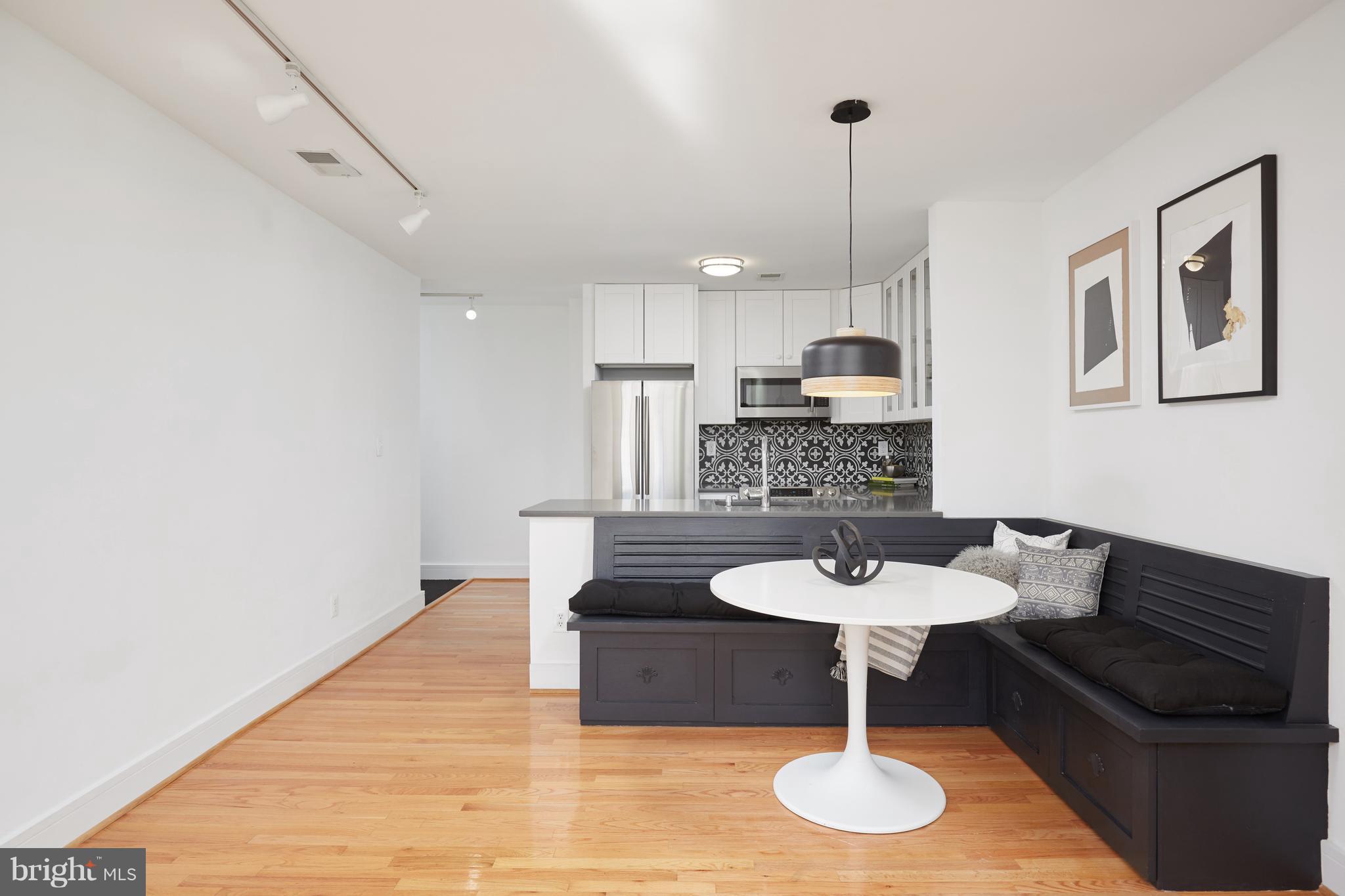 2901 16th Street Northwest, Unit 504 Washington, DC 20009 - Photo 10 of 30 Eat-In Kitchen with Built-In Seating & Storage