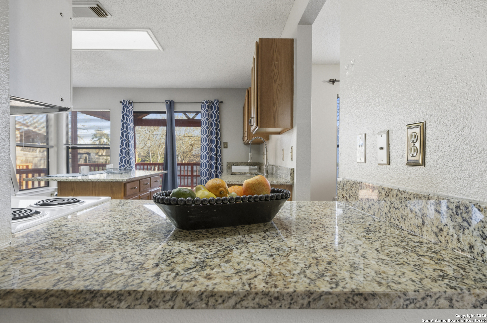1048 Sycamore Schertz, TX 78154 - Photo 15 of 31 a living room with furniture and a large window