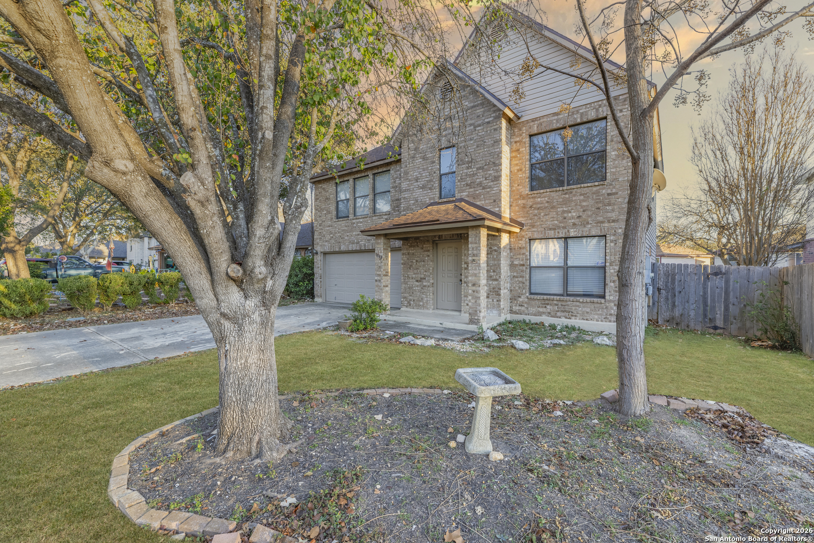 1048 Sycamore Schertz, TX 78154 - Photo 2 of 31 a front view of a house with garden