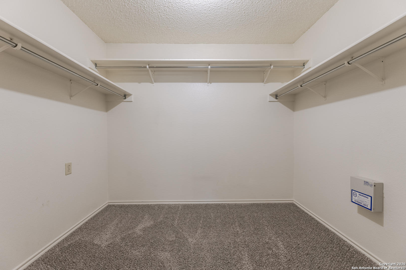 1048 Sycamore Schertz, TX 78154 - Photo 26 of 31 a view of an empty walk in closet