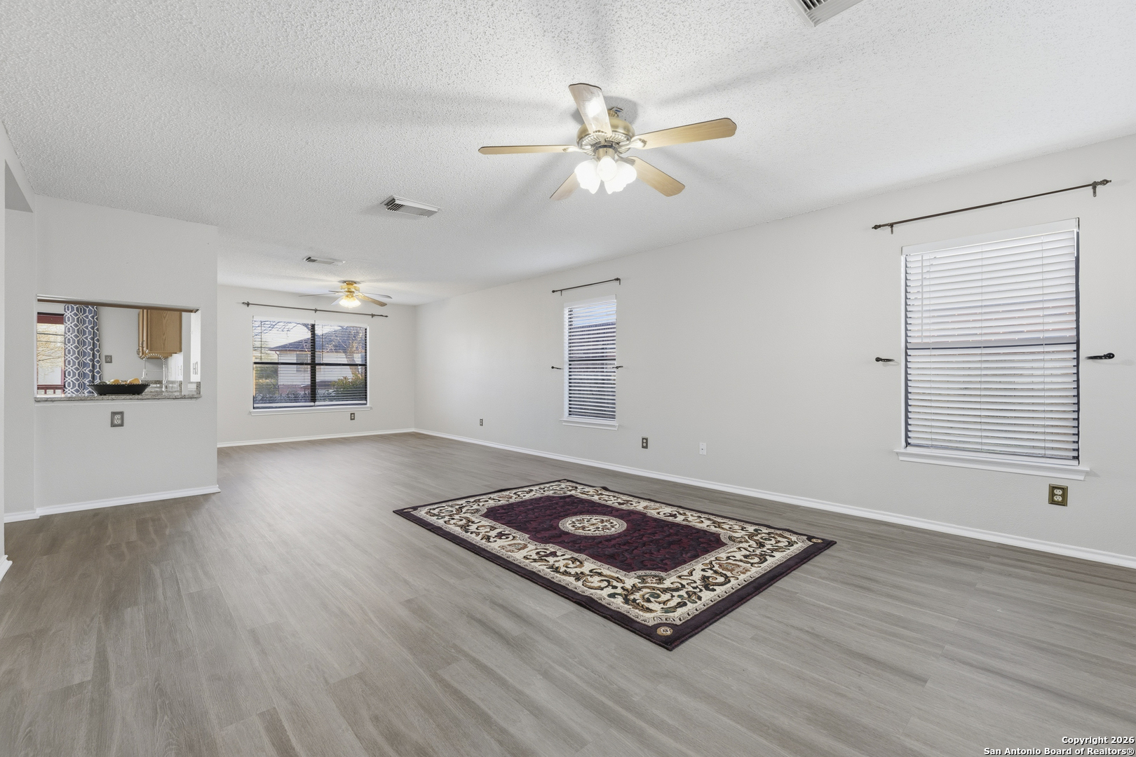 1048 Sycamore Schertz, TX 78154 - Photo 3 of 31 a living room with furniture and a flat screen tv