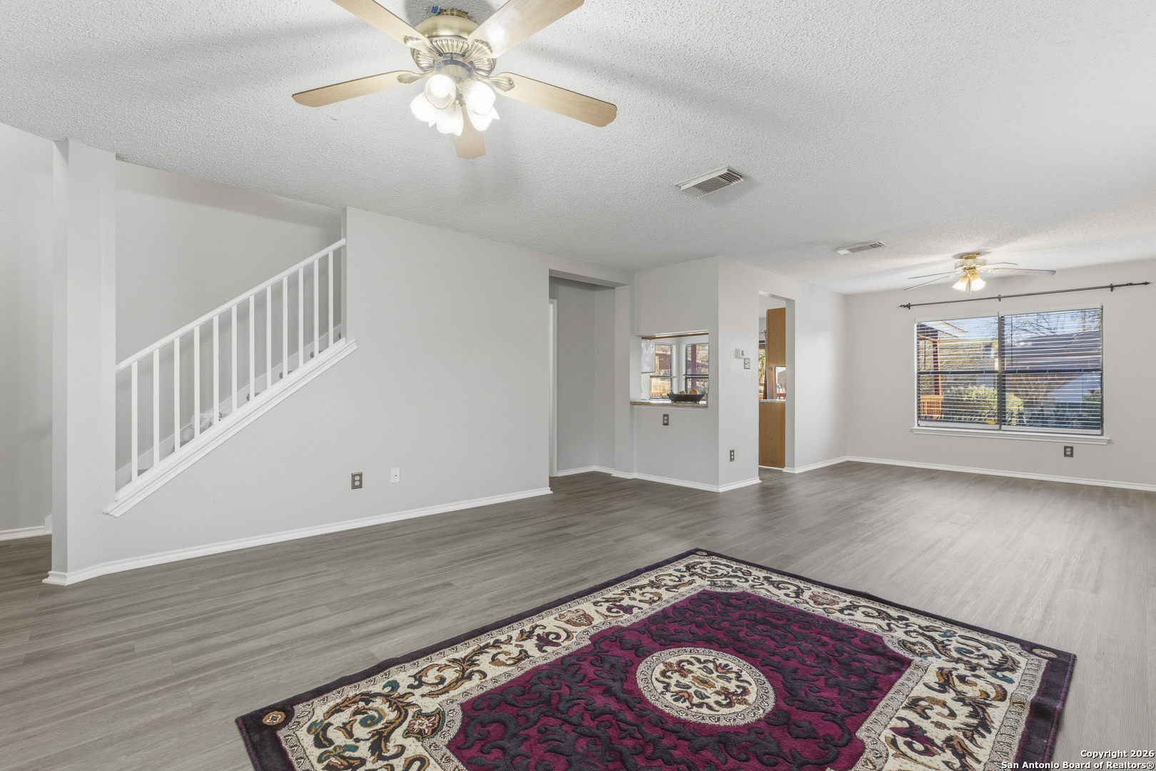 1048 Sycamore Schertz, TX 78154 - Photo 6 of 31 a view of an empty room with a window